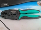Pro'skit Ratcheted Crimper CP-336F Black/green Used. Price: $40.00.