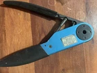 Daniels Manufacturing Corp. M22520/31-01 Hand Crimper Tool With Black Sheath Used. Price: $275.00.