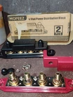 Mofeez Power Distribution Block Bus Bar, 4 X 3/8" Posts, 6 #8 Screws Terminals New. Price: $29.98.