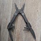 Gerber Black Stainless Steel Multi-tool Plier Knife Wire Cutter Serrated Used. Price: $35.00.