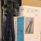 Tyco Electronics 2-1579005-2 Hand Crimp Tool & 7-1579001-9 Solarlok Locator New. Price: $130.00.